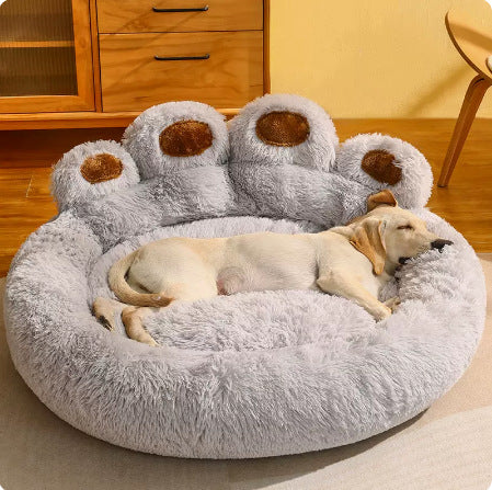 Dog asleep in the gray plush paw pet bed