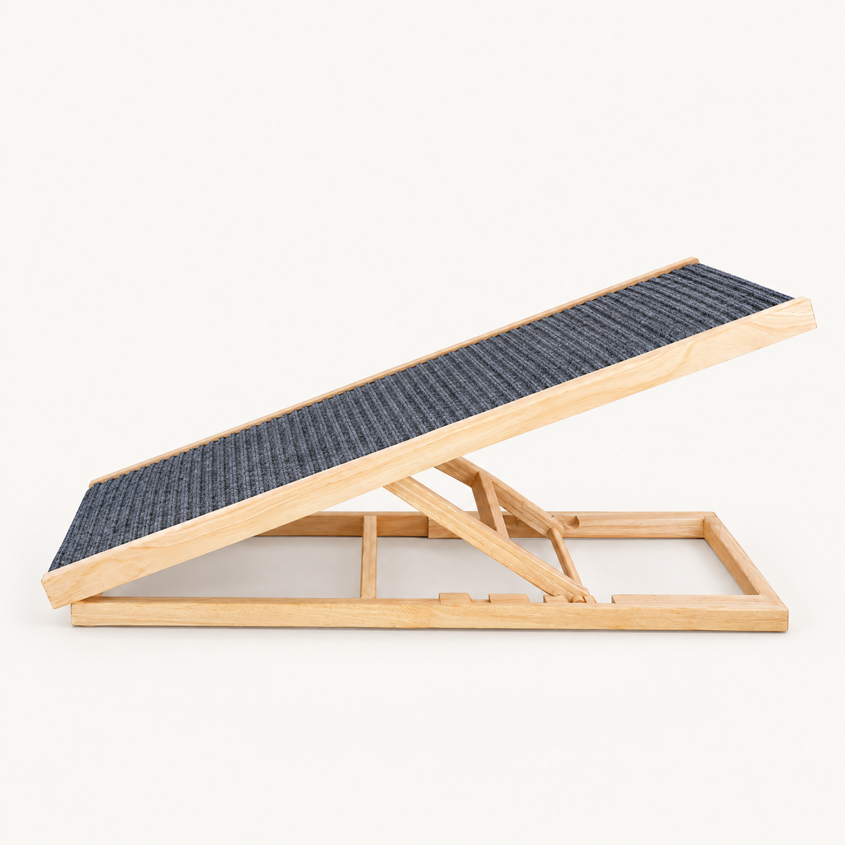 Solid wood pet steps on a plain warm off-white background